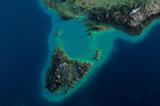 How does the isolation of Tasmania impact recent universal ancestry?